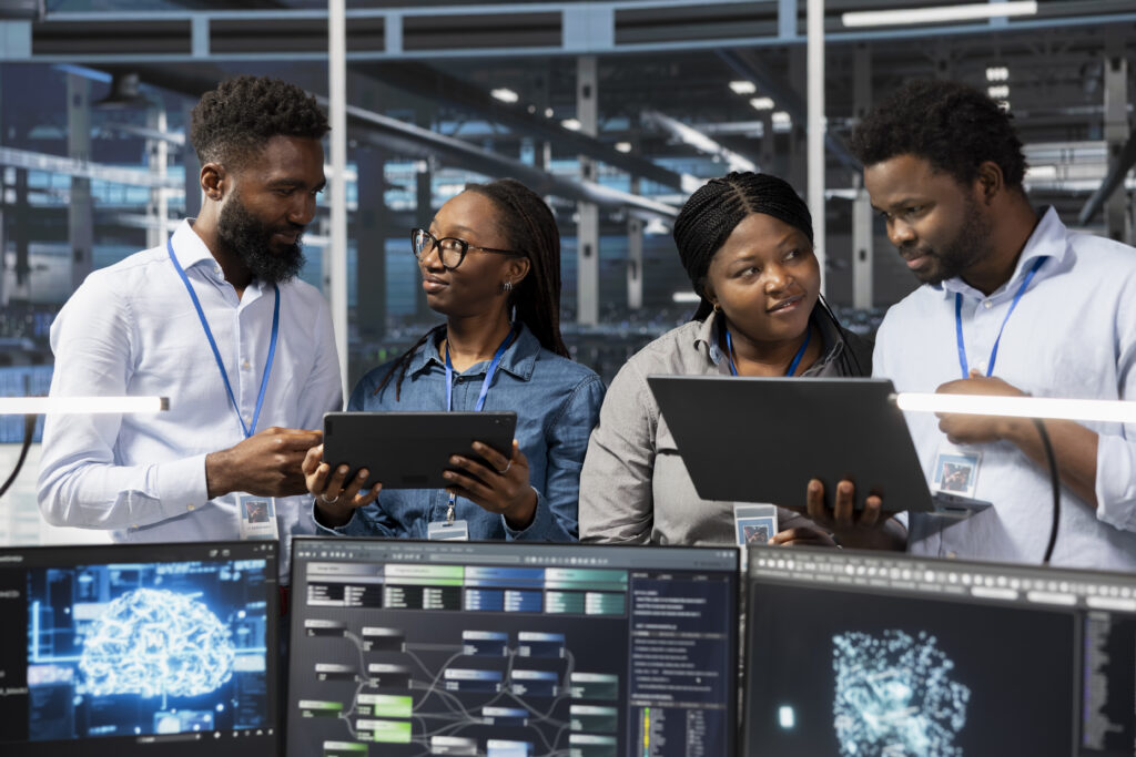 server room colleagues use artificial intelligence to perform computing tasks