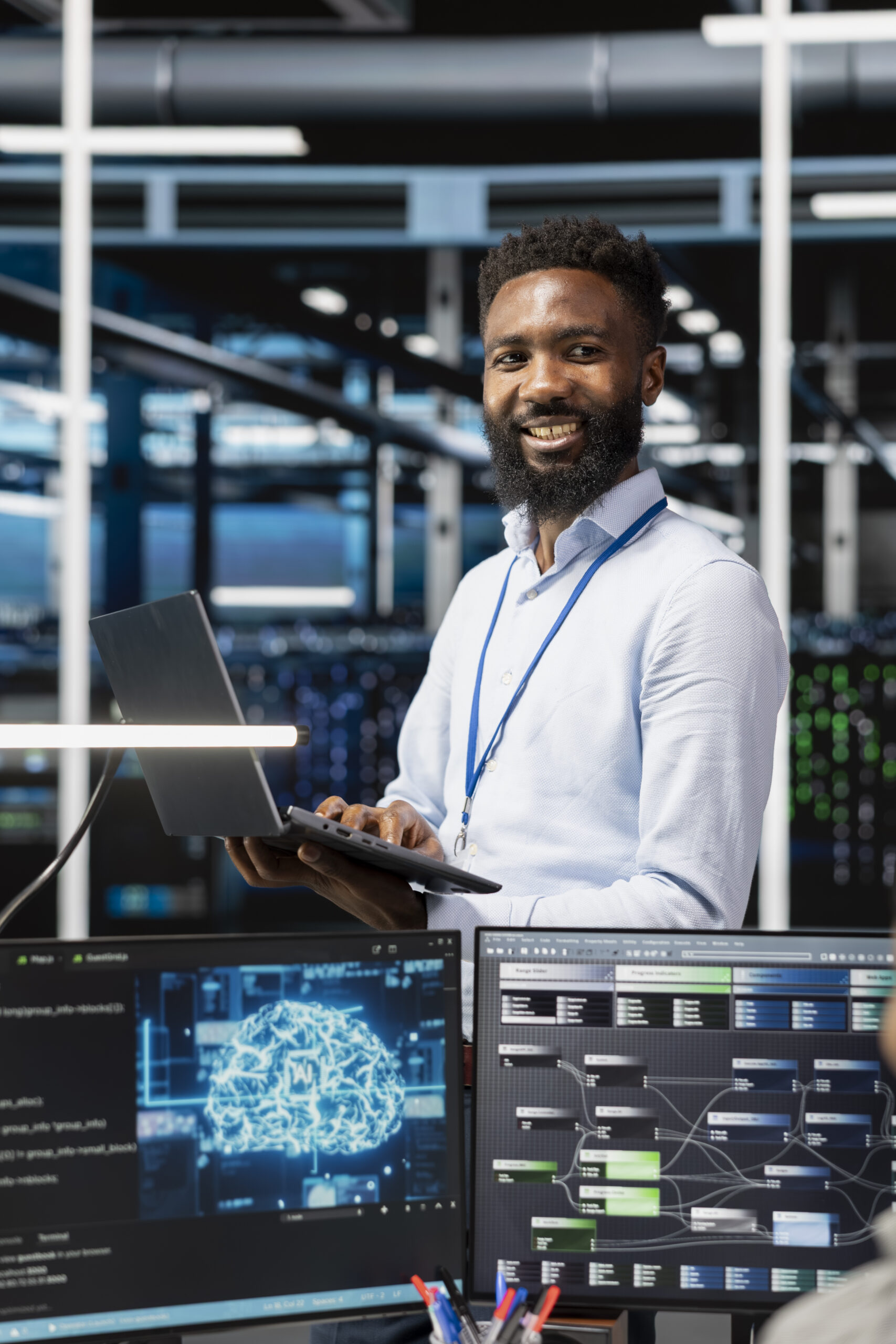 cheerful man in server hub facility using artificial intelligence